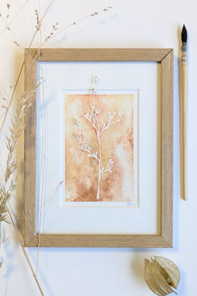 Abstract bloem aquarel in oranje kleuren in passepartout